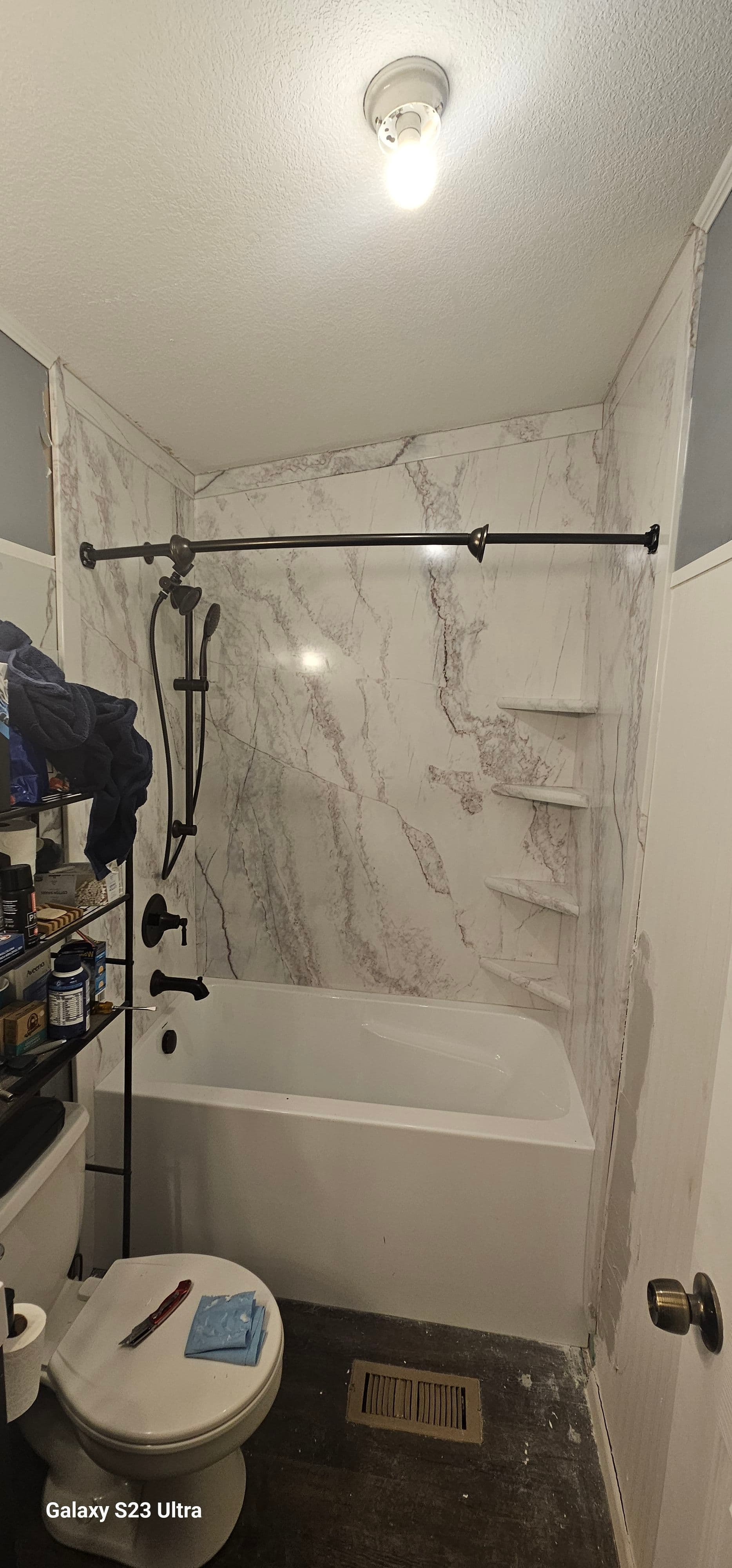 Fresh Bathroom Install With a Sharp Marble-Look Surround image