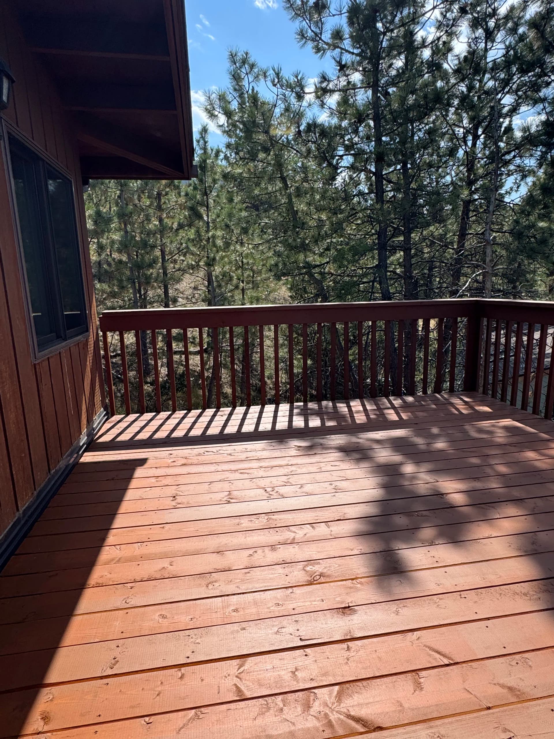 Fresh Deck Build With Clean Railing and Solid Wood Finish