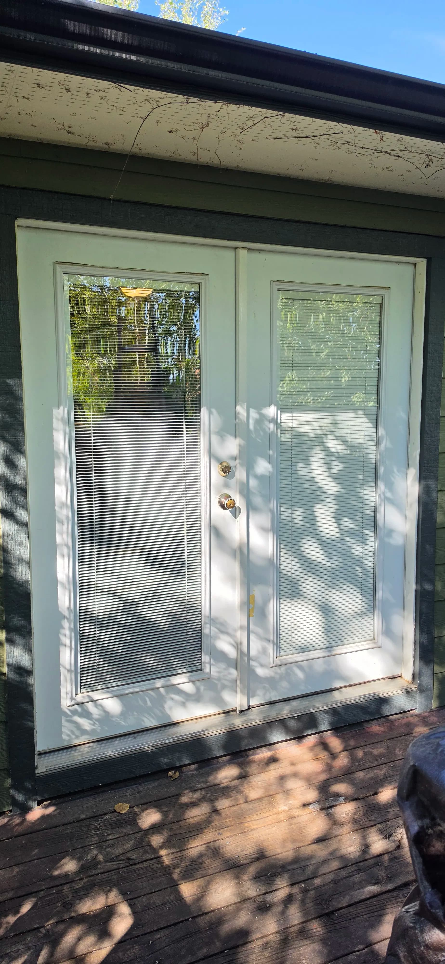 Old French Door Swapped for a Clean New Sliding Glass Door