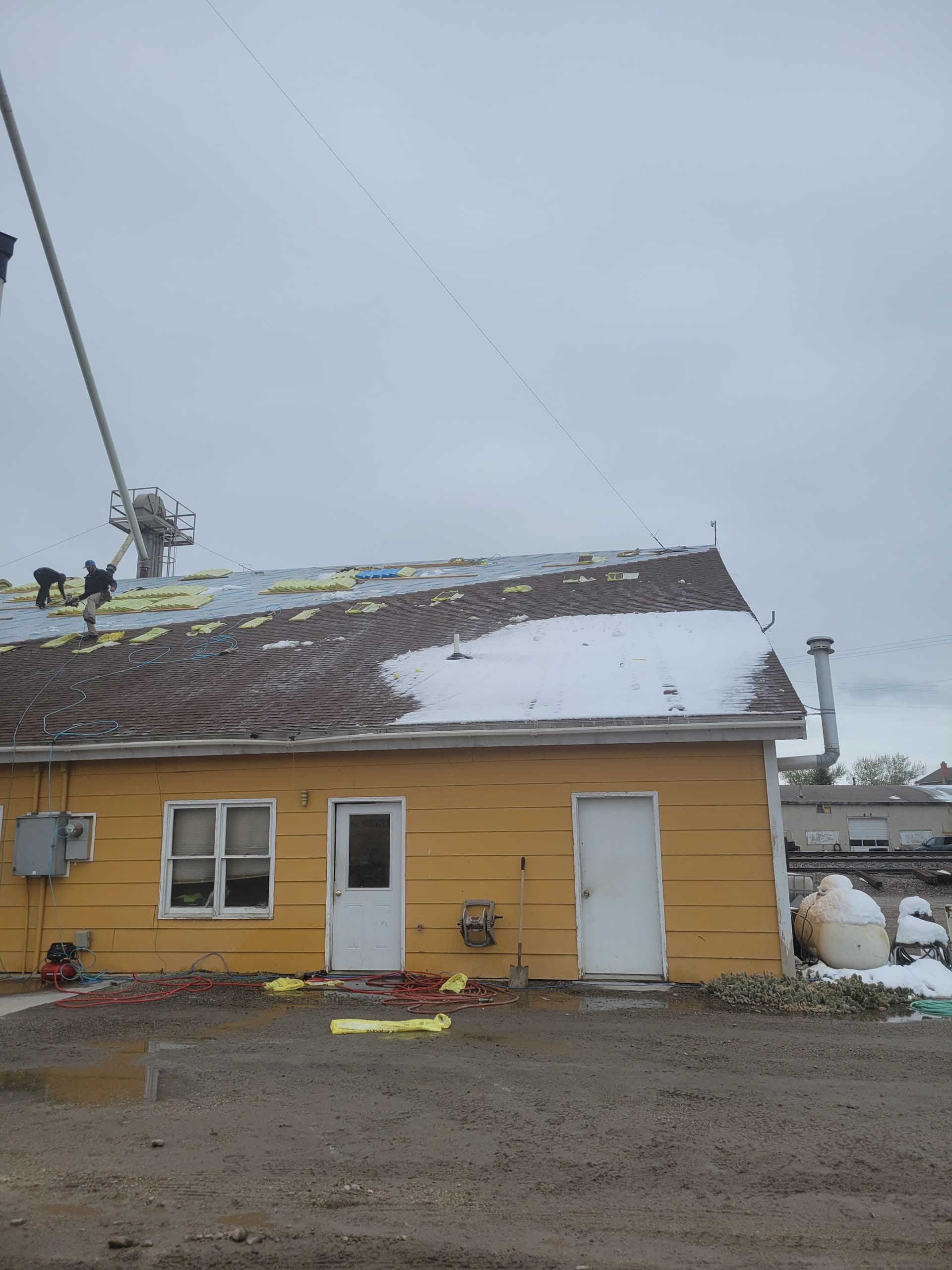 Commercial Roof Replacement Done Right - Snow and All image