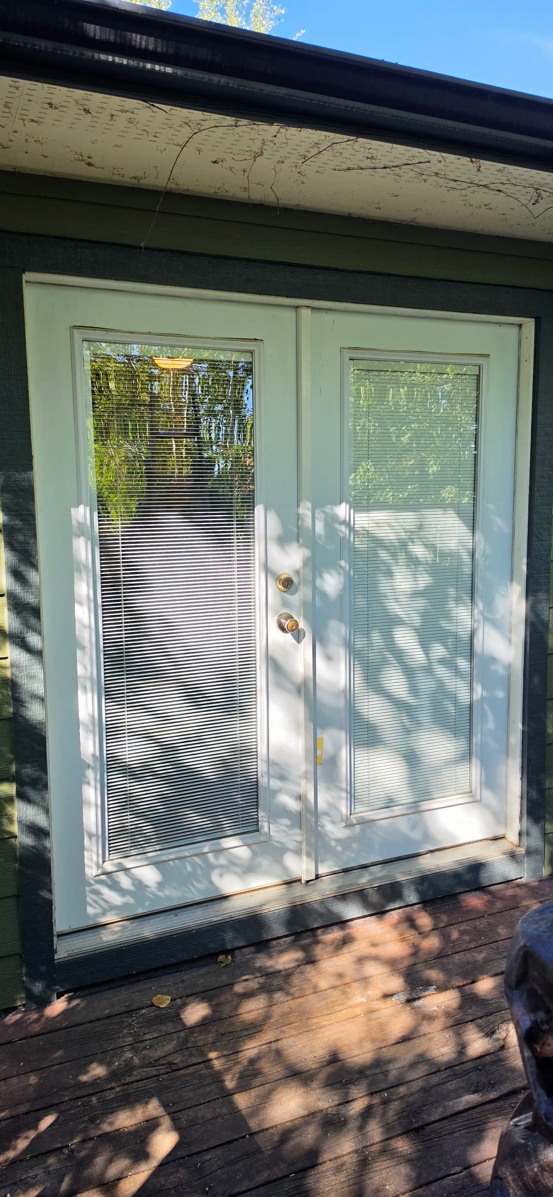 Gallery photos for Old French Door Swapped for a Clean New Sliding Glass Door: Image #1